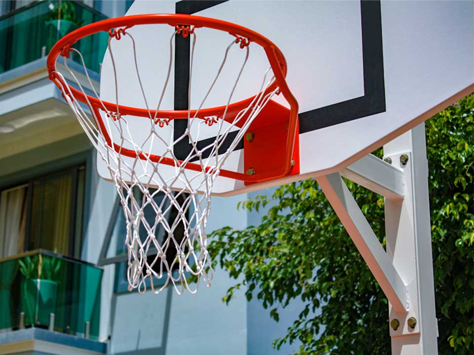 Outdoor groundbolted basketball goal, projection 0.6m, adjustable ring